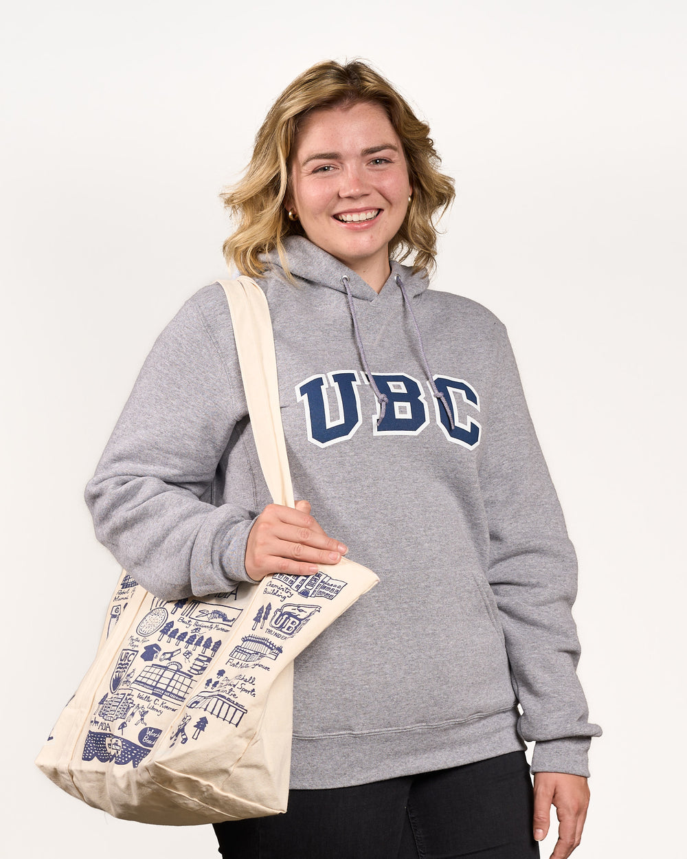 UBC-Everyday-Hoodie-Grey-Small-Front-Holding-Julia-Gash-Tote-02
